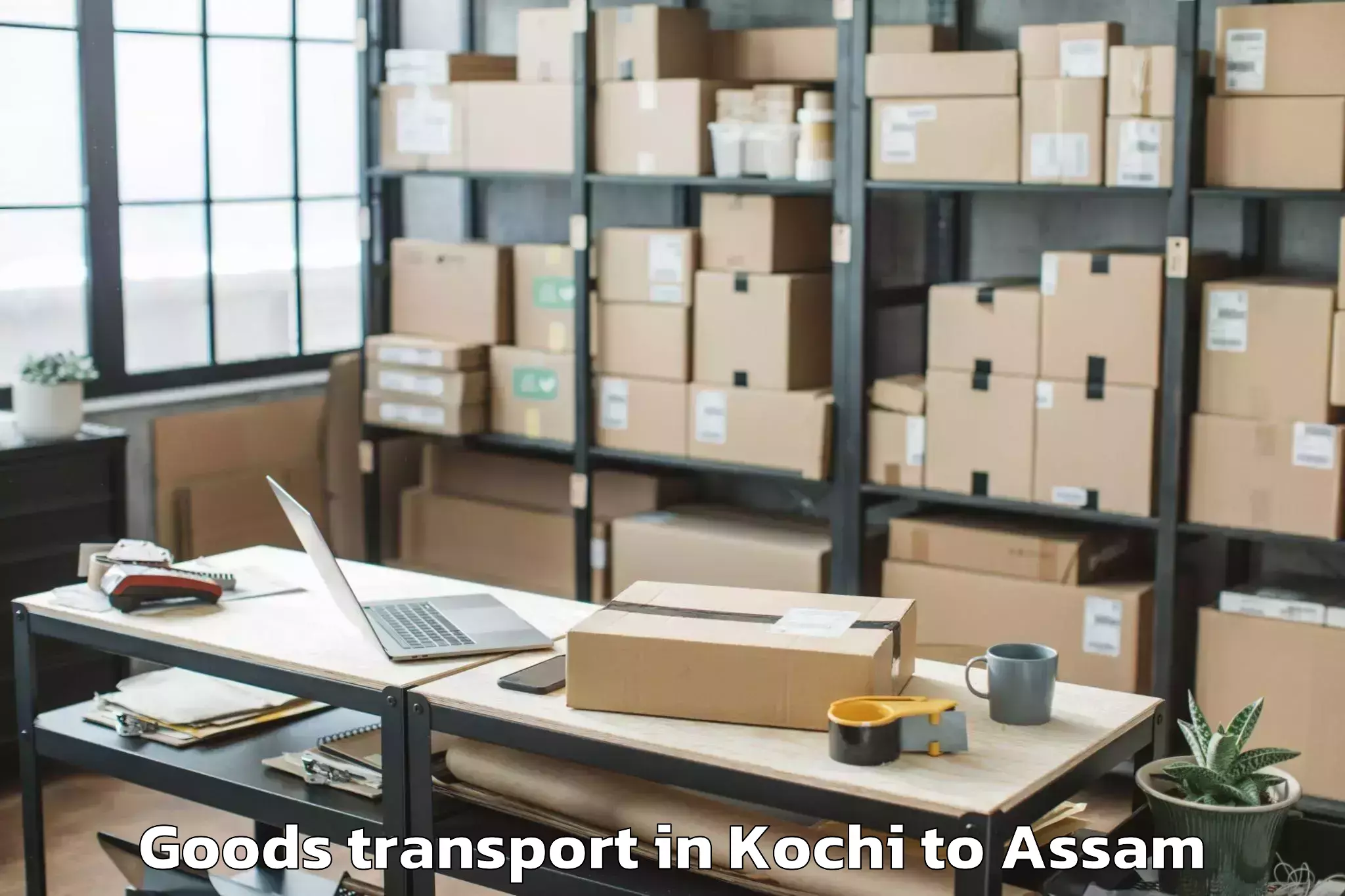 Book Kochi to Dhakuakhana Pt Goods Transport Online